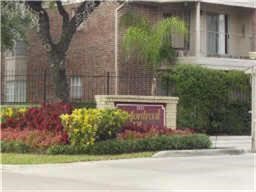 2121 Hepburn Street, Unit 404 Houston, TX 77054 - Photo 3 of 30 a front view of a house with garden