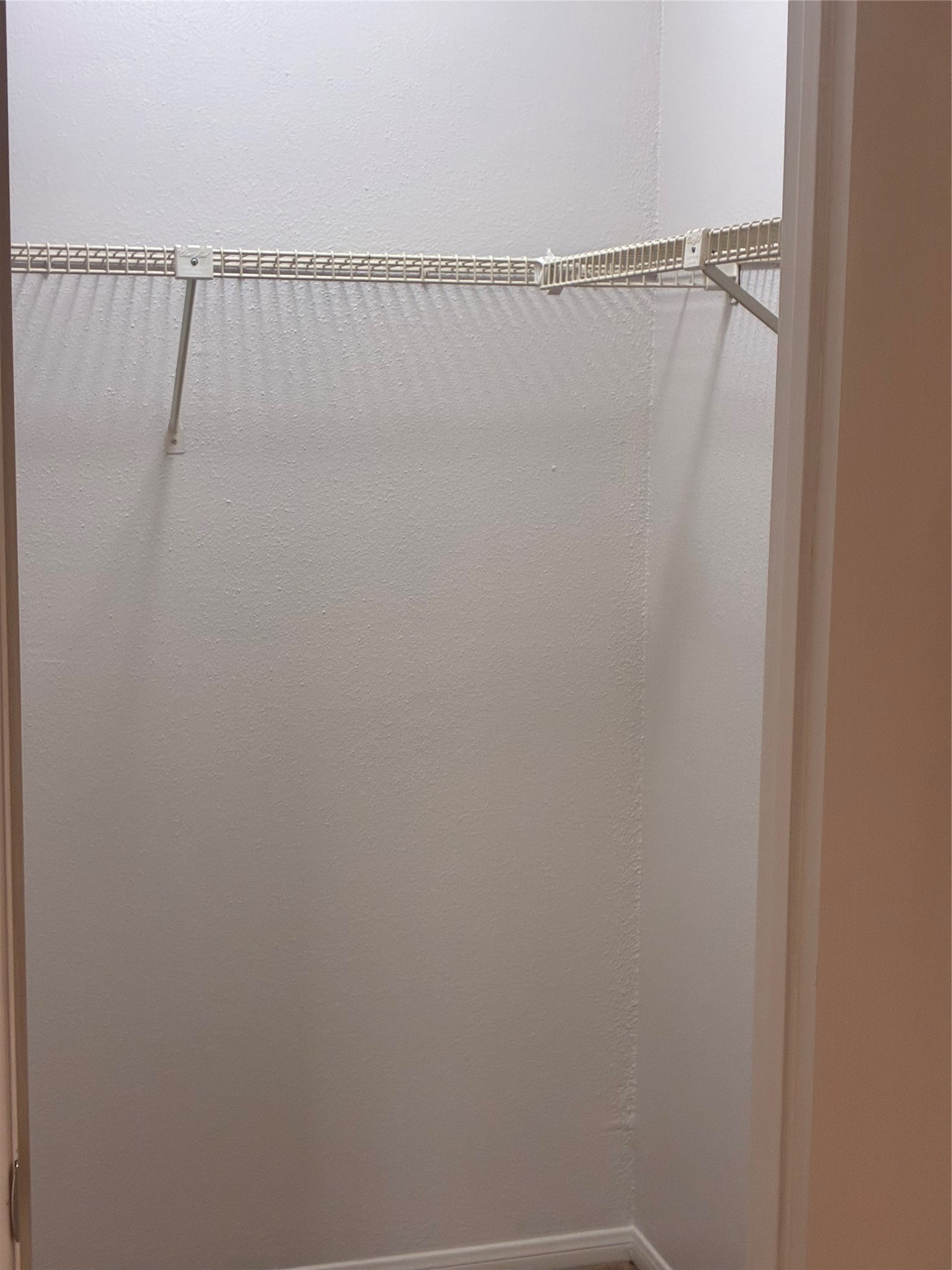 2121 Hepburn Street, Unit 404 Houston, TX 77054 - Photo 6 of 30 a view of small space with racks on the wall