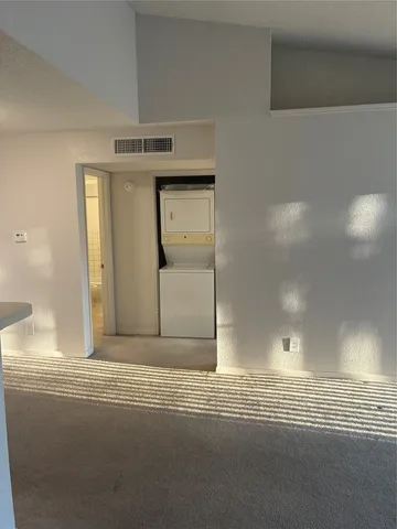 a view of a livingroom with wooden floor