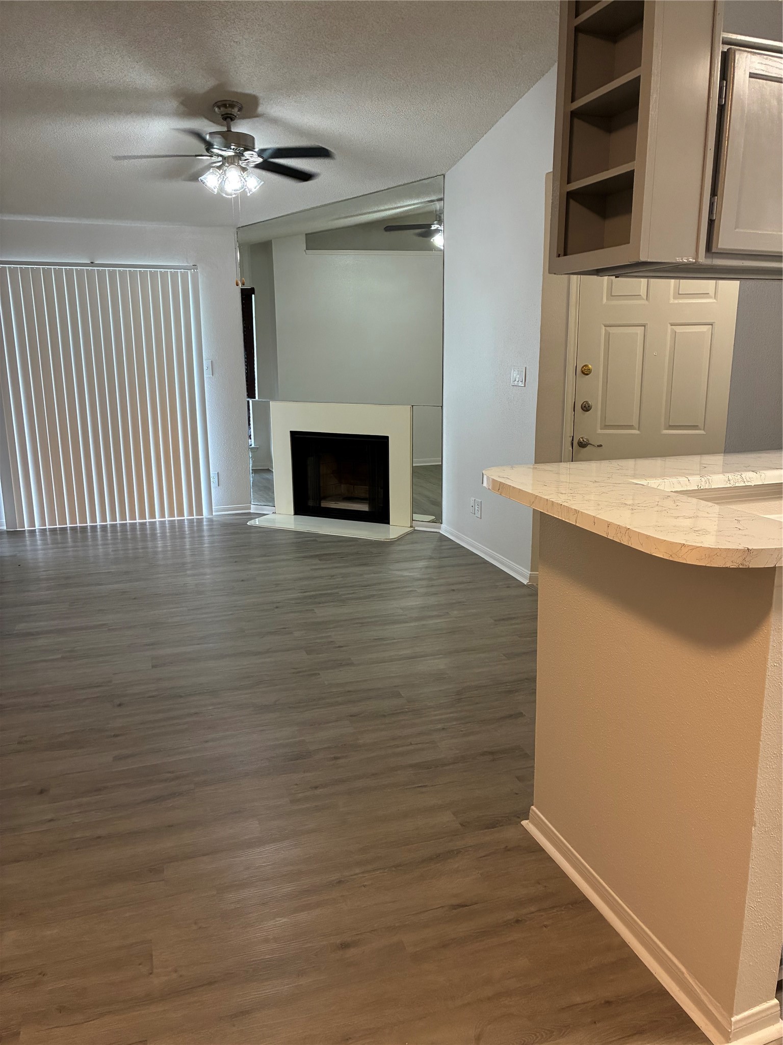 2121 Hepburn Street, Unit 404 Houston, TX 77054 - Photo 10 of 30 a view of a kitchen with cabinets and wooden floor