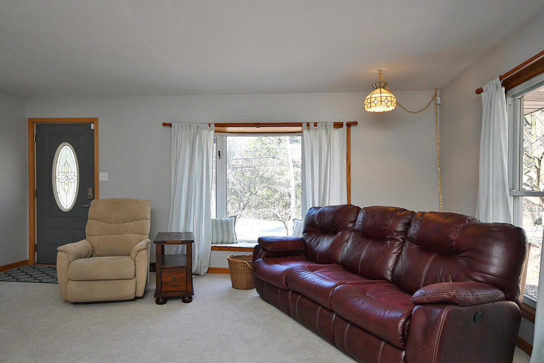 176 4 Mile Road Northwest Comstock Park, MI 49321 - Photo 5 of 27 Living1