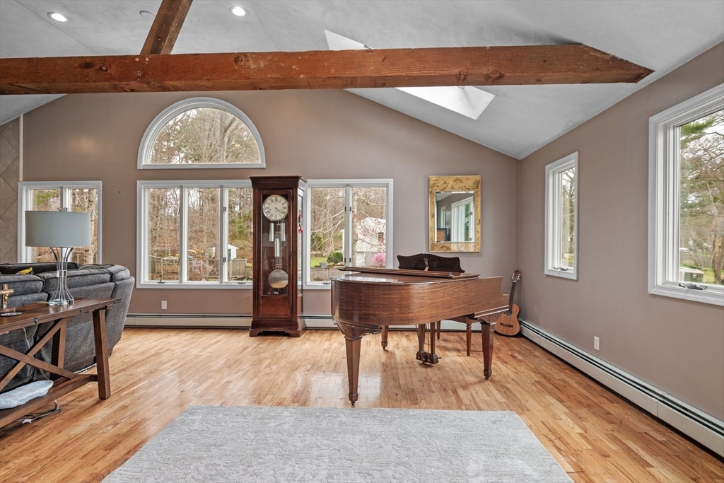 187 Echo Cove Road Hamilton, MA 01982 - Photo 23 of 42 a view of a livingroom with furniture window and wooden floor