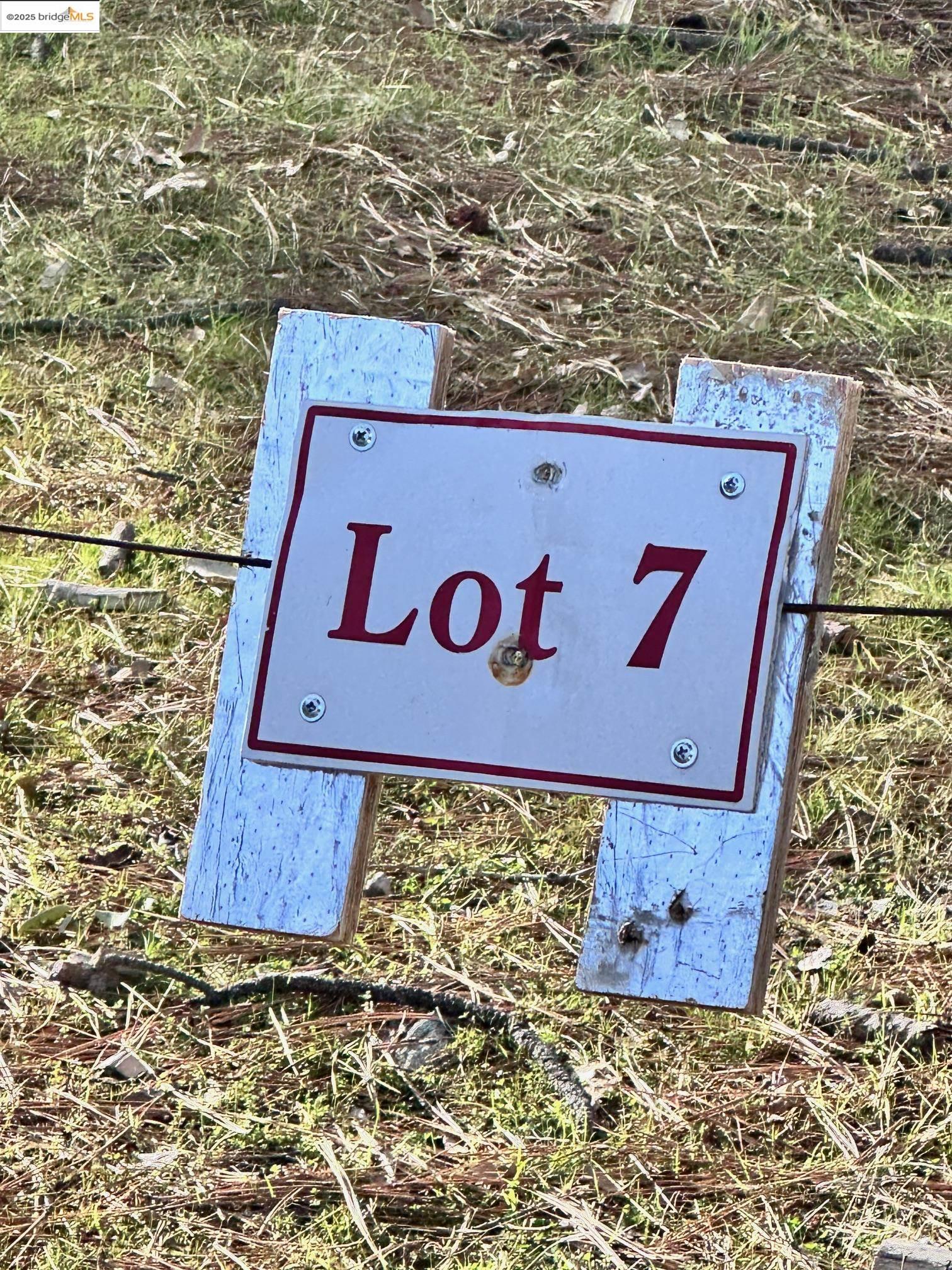 16655 Granite Ridge Lane Sonora, CA 95370 - Photo 12 of 16 a sign board with wooden floor