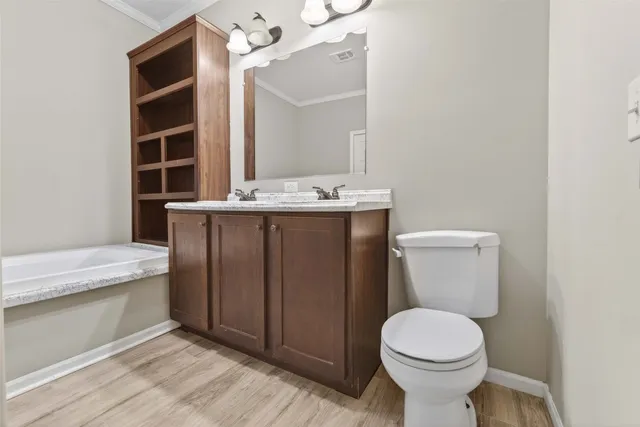 a bathroom with a sink and a toilet
