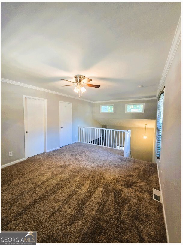1674 Wynndowne Trail Smyrna, GA 30080 - Photo 12 of 15 a view of a big room with staircase and kitchen view