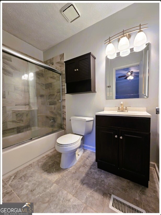 1674 Wynndowne Trail Smyrna, GA 30080 - Photo 13 of 15 a bathroom with a toilet a sink and mirror