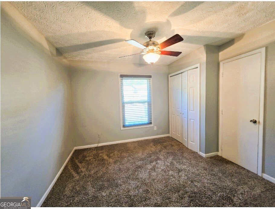 1674 Wynndowne Trail Smyrna, GA 30080 - Photo 8 of 15 a view of an empty room and window
