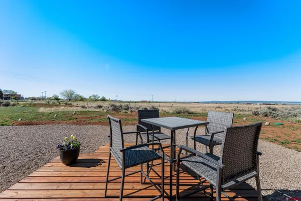 a view of a terrace with furniture and stove