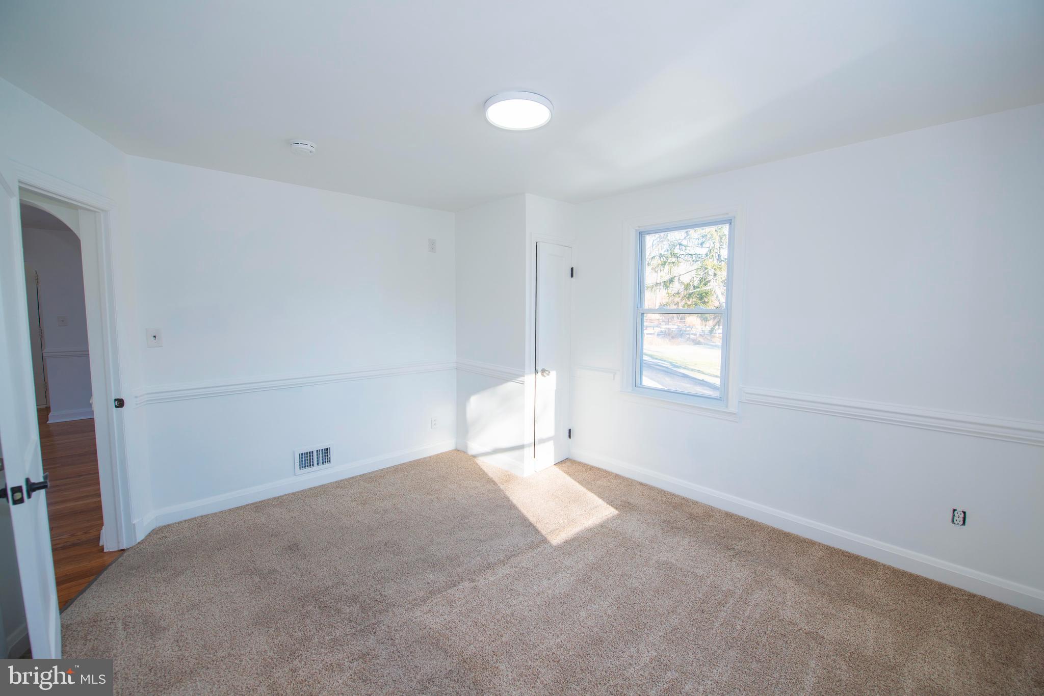 10909 Philadelphia Road White Marsh, MD 21162 - Photo 15 of 49 a view of an empty room with a window