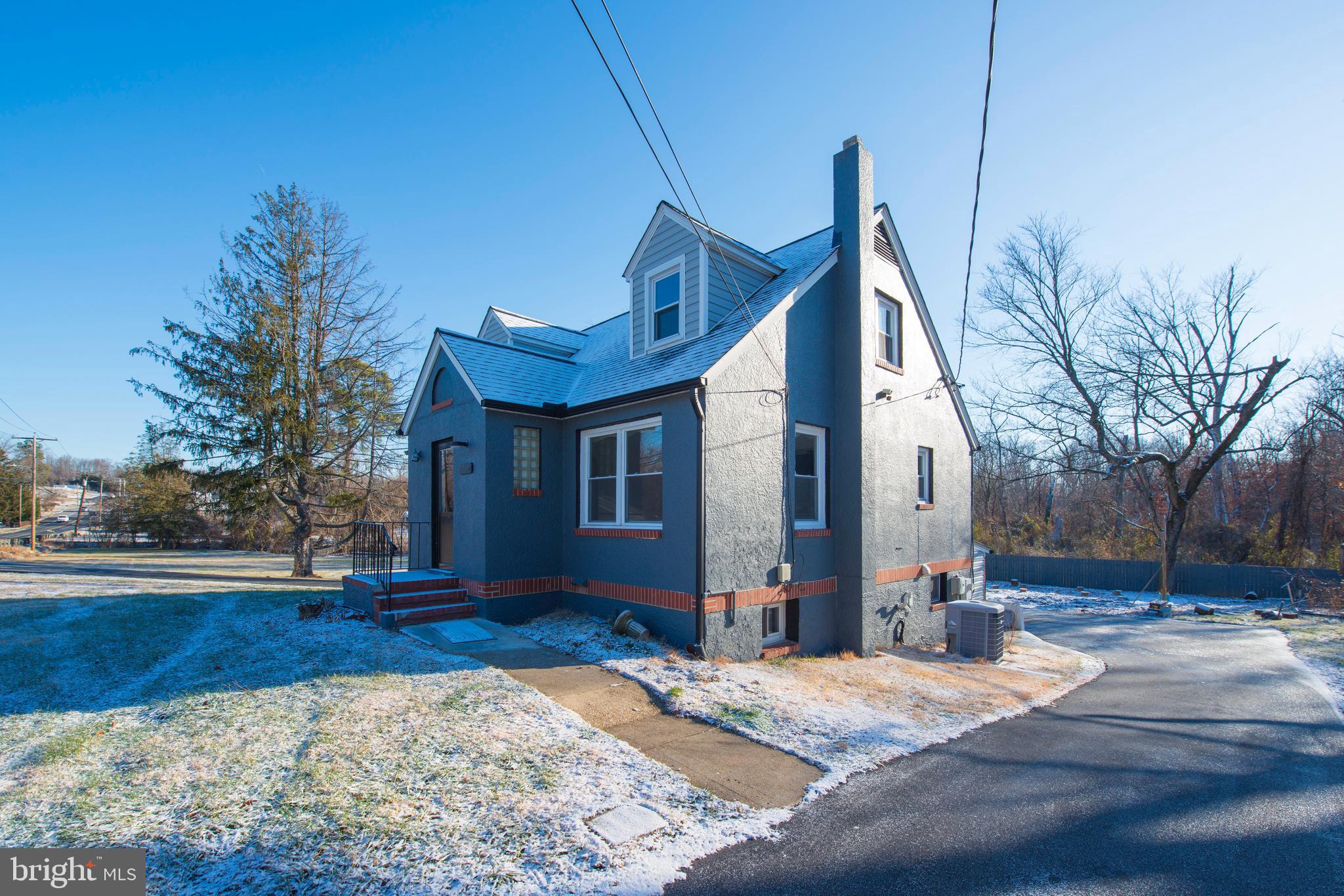 10909 Philadelphia Road White Marsh, MD 21162 - Photo 2 of 49 a front view of a house with a yard