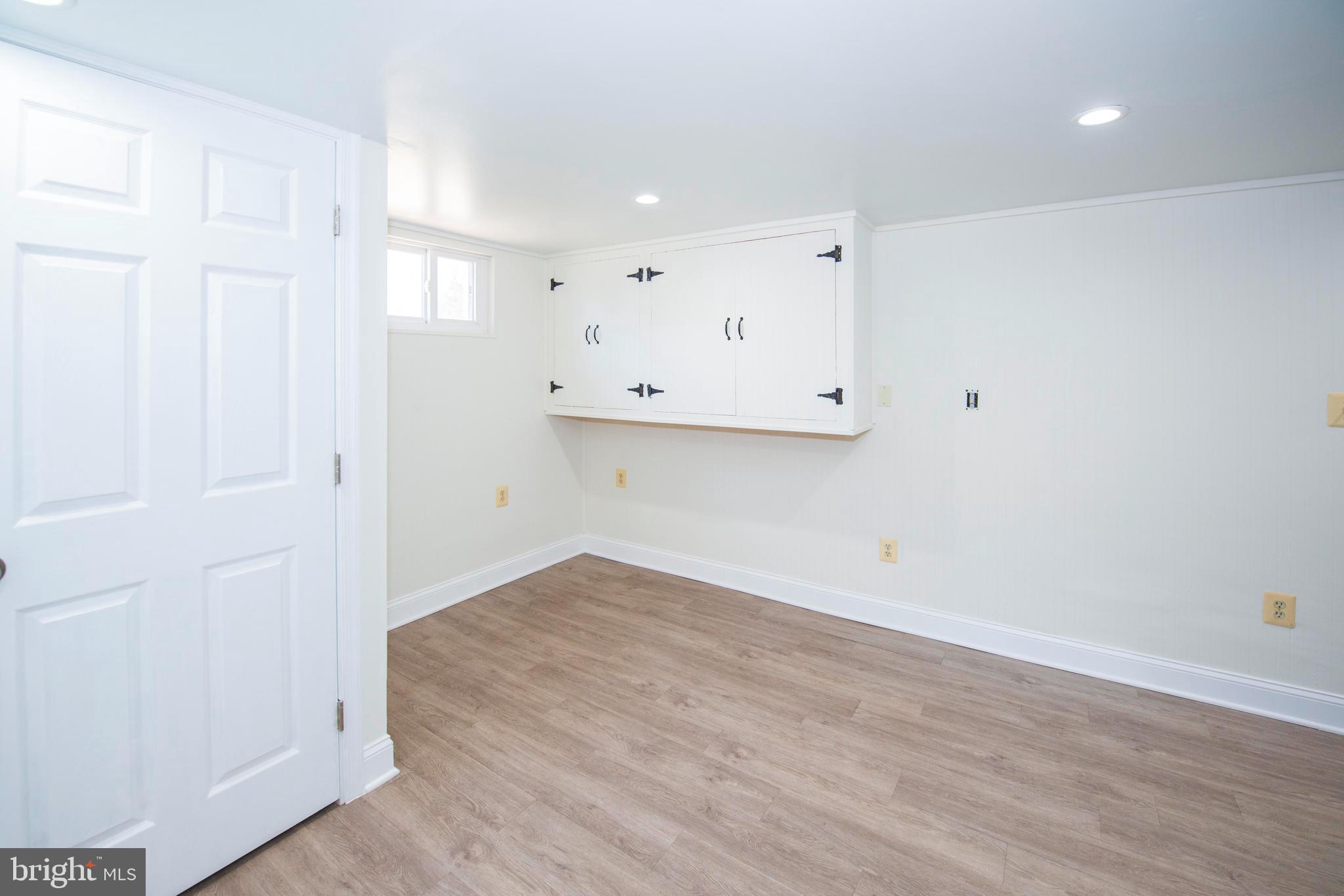 10909 Philadelphia Road White Marsh, MD 21162 - Photo 21 of 49 a view of a room with wooden floor