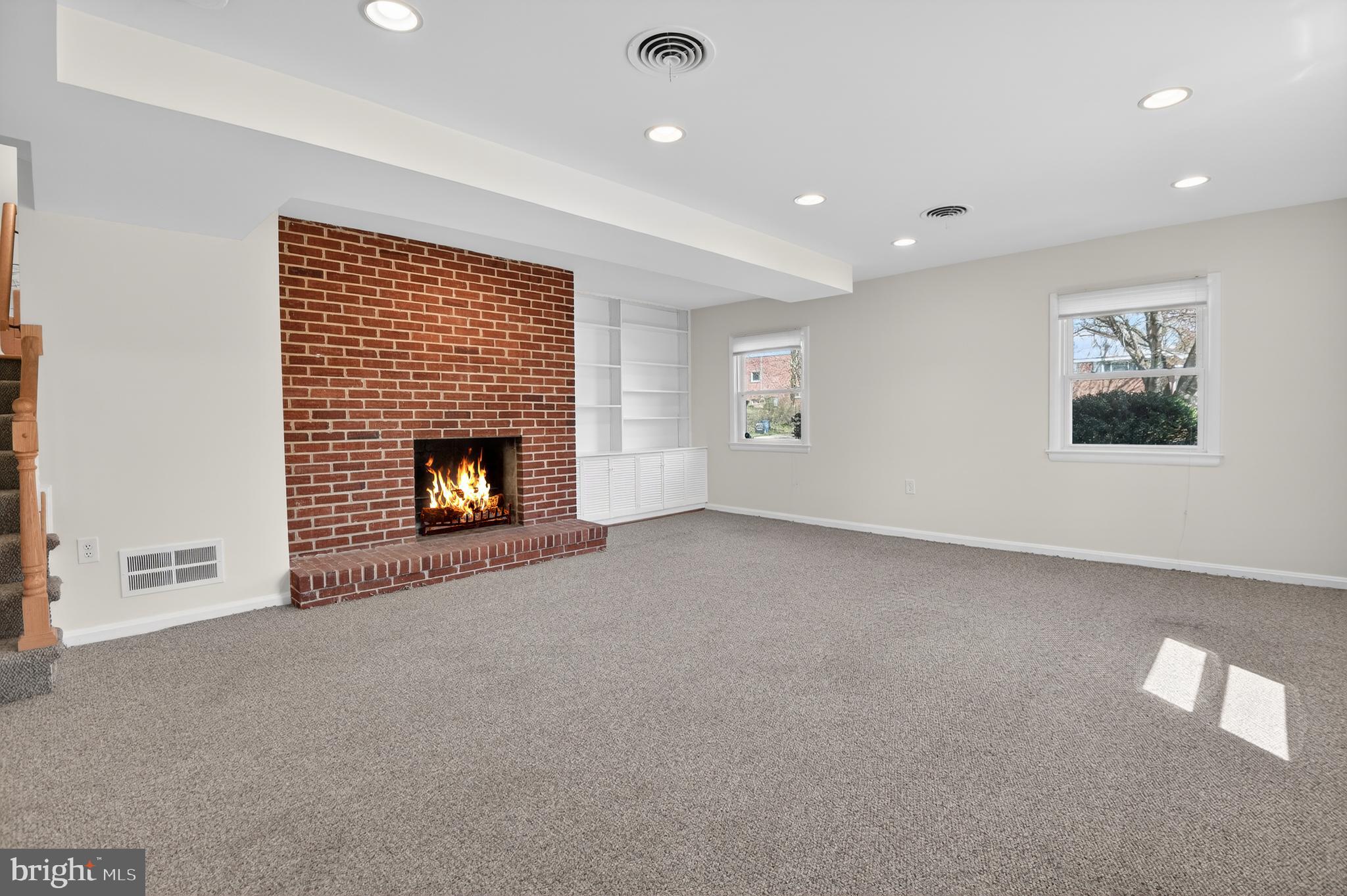 11004 Oakwood Street Silver Spring, MD 20901 - Photo 25 of 35 a view of empty room with a fireplace