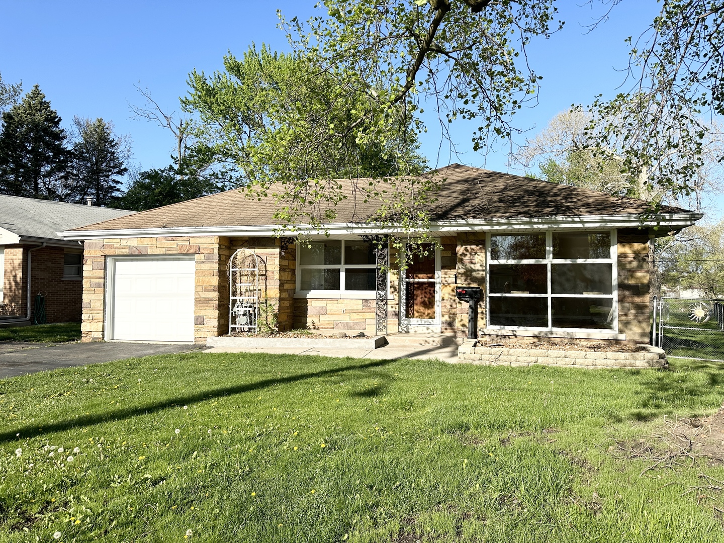 460 South Wall Street Kankakee, IL 60901 - Photo 1 of 52 a front view of a house with a yard and porch