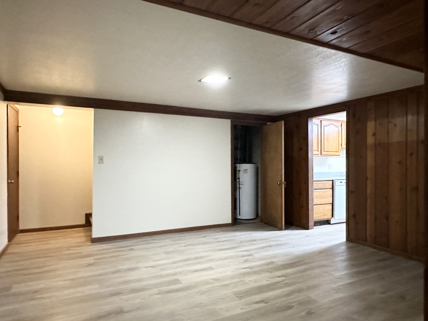 460 South Wall Street Kankakee, IL 60901 - Photo 26 of 52 a view of an empty room with wooden floor and a window
