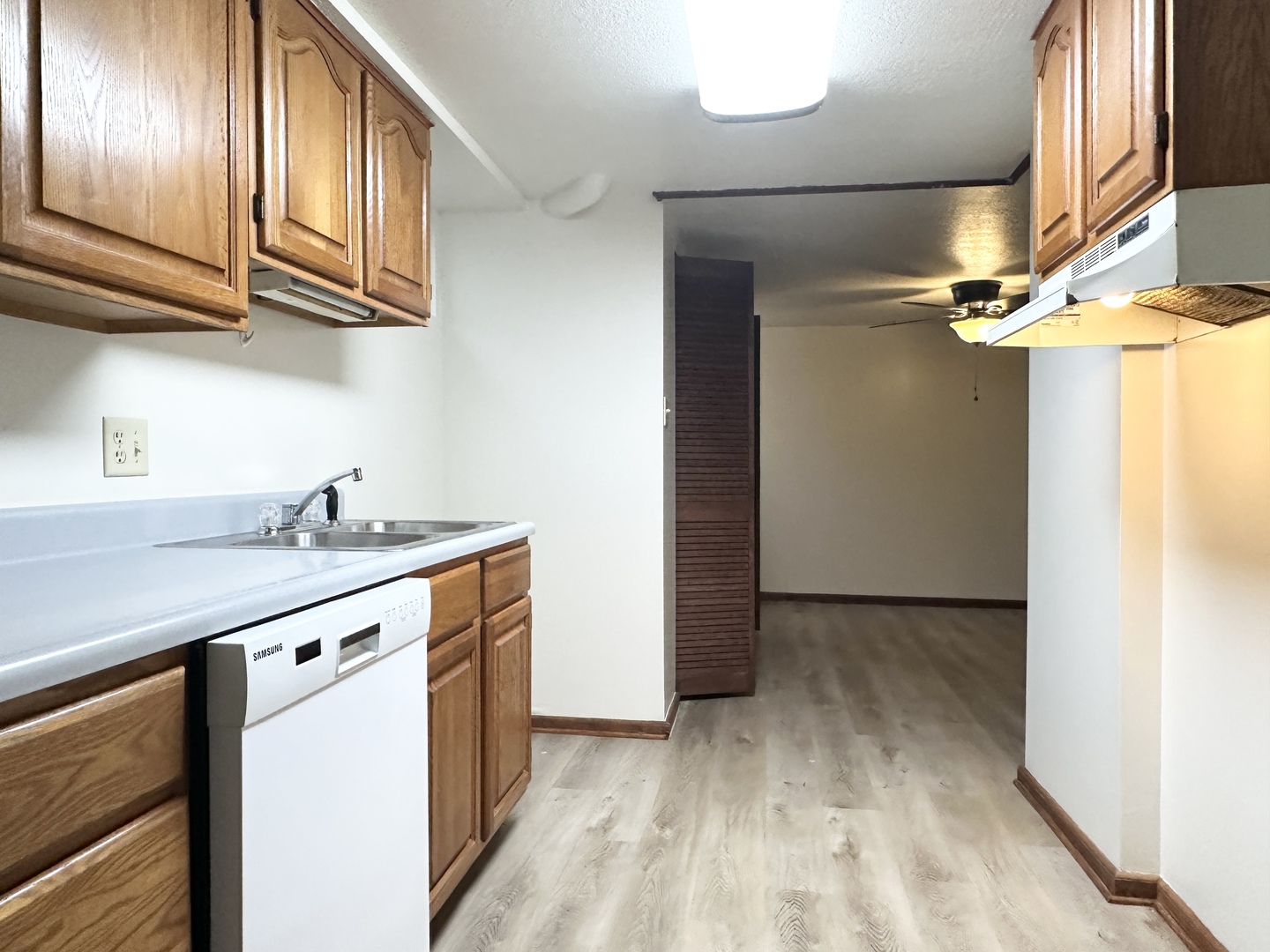 460 South Wall Street Kankakee, IL 60901 - Photo 27 of 52 a kitchen with stainless steel appliances granite countertop a sink and a refrigerator