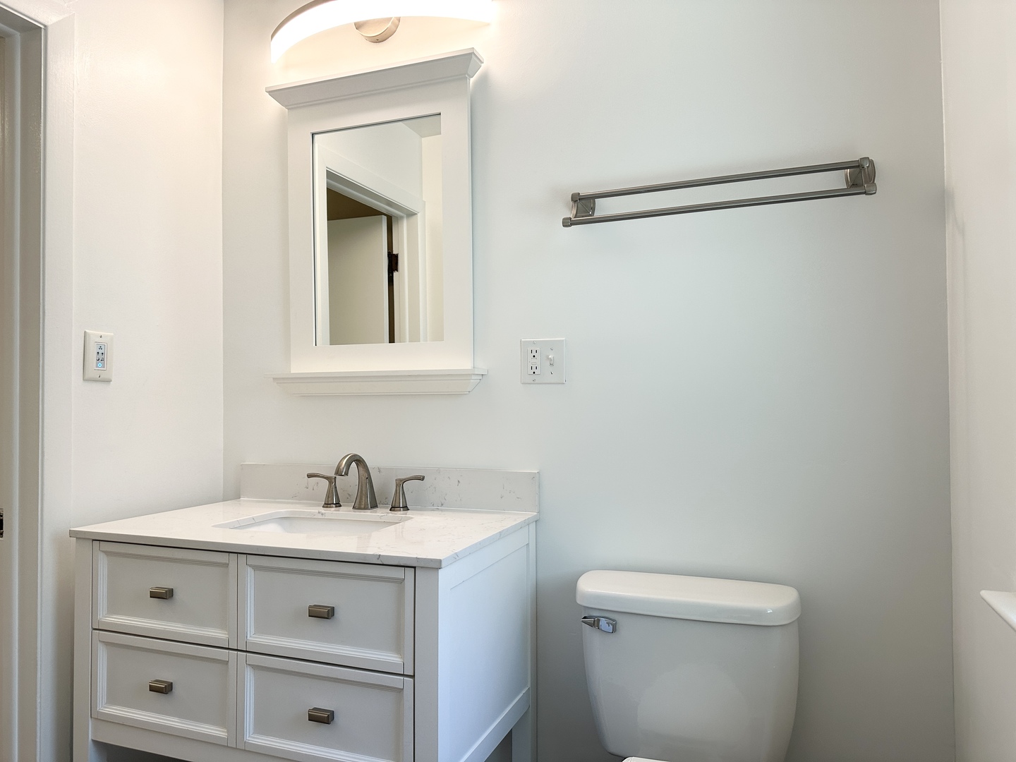 460 South Wall Street Kankakee, IL 60901 - Photo 33 of 52 a bathroom with a sink a toilet and vanity