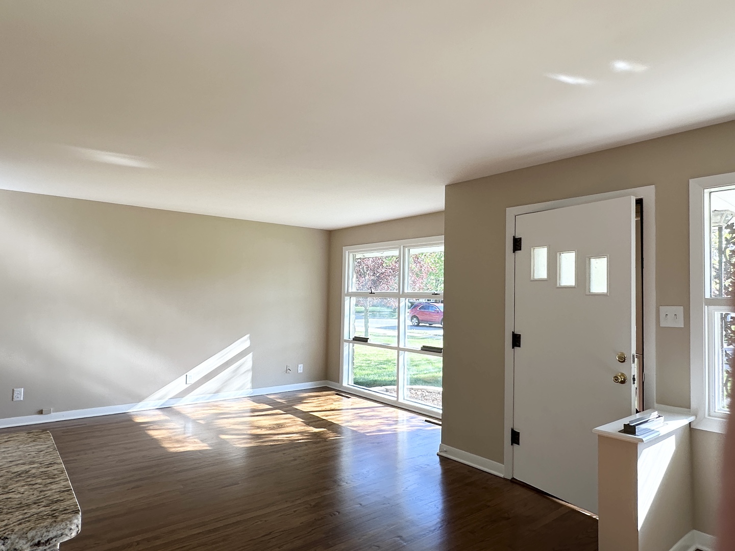 460 South Wall Street Kankakee, IL 60901 - Photo 10 of 52 wooden floor in an empty room with a window