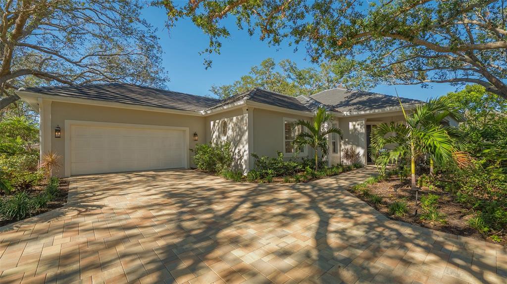 32 Bayhead Lane Osprey, FL 34229 - Photo 1 of 1 a front view of a house with a yard and garage