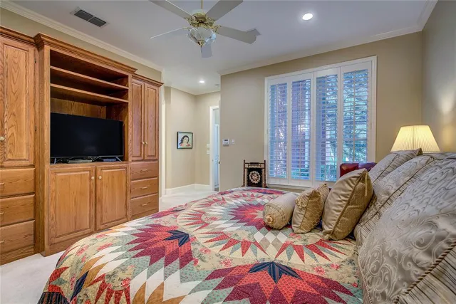 a bathroom with a sink mirror and vanity