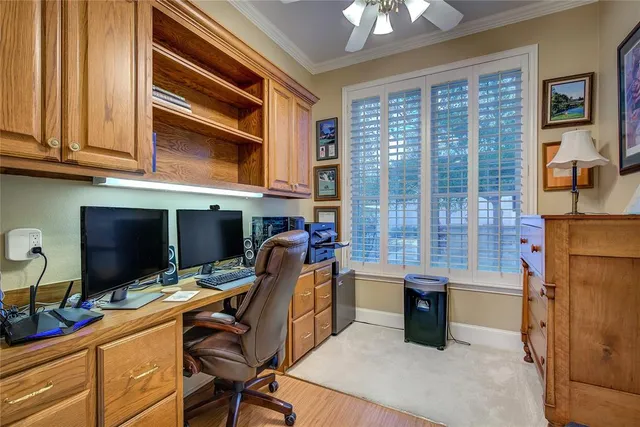 a spacious bedroom with a bed and dresser