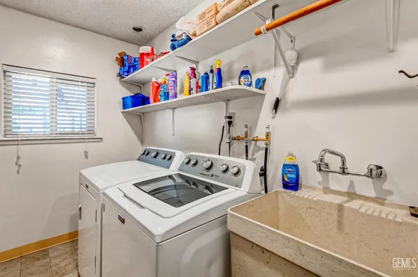 a bathroom with a sink toilet and vanity