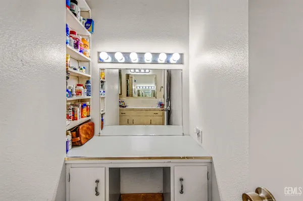 a view of a porch with furniture and a tree