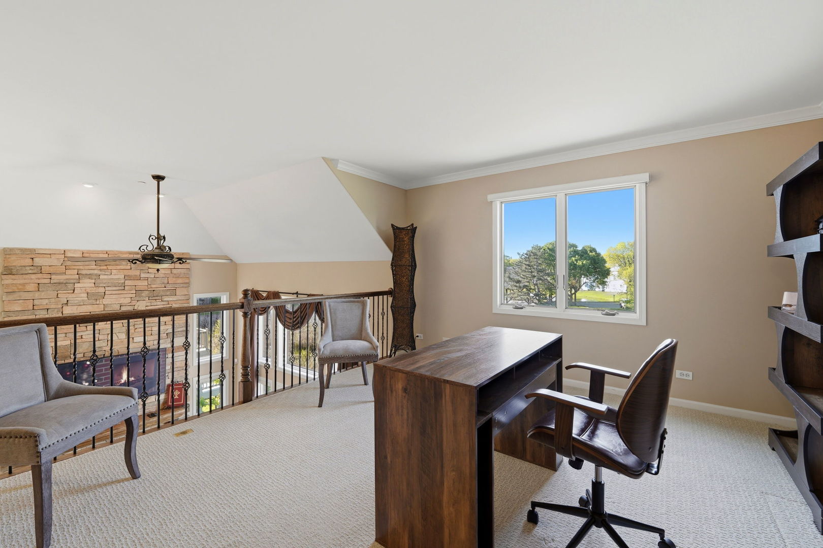 1406 Rue Paris Place Inverness, IL 60067 - Photo 17 of 35 a view of a workspace with furniture and a window
