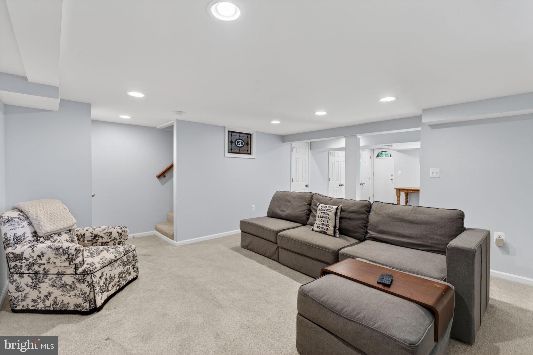 158 Hopkins Road Baltimore, MD 21212 - Photo 37 of 68 Cozy basement retreat with modern flair.
