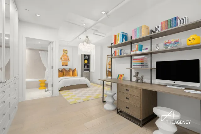 a bathroom with a double vanity sink mirror and bathtub