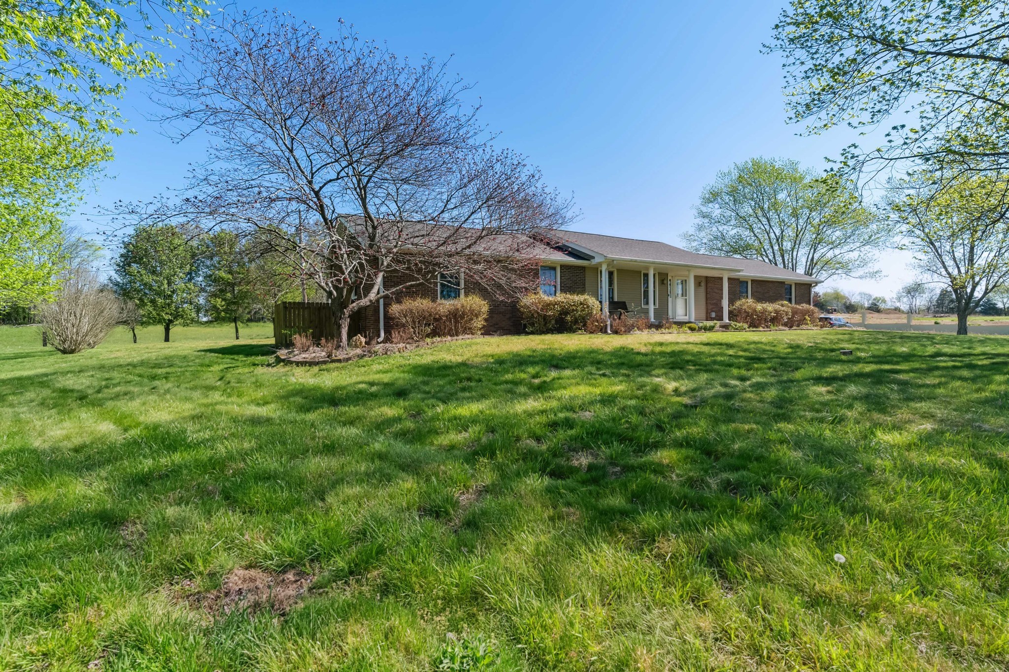 4520 Mt Sharon Road Greenbrier, TN 37073 - Photo 1 of 42 a view of a house with a big yard