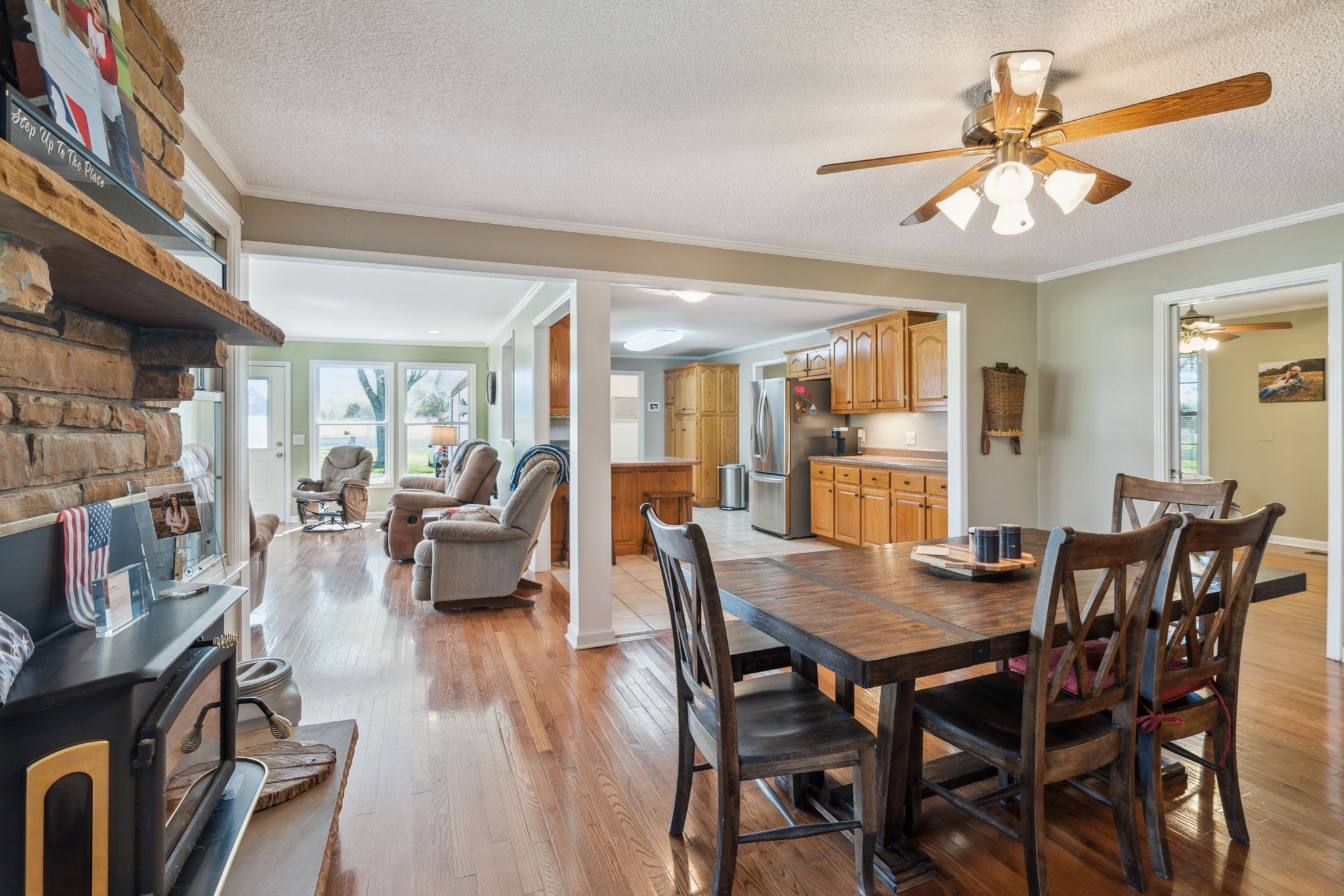 4520 Mt Sharon Road Greenbrier, TN 37073 - Photo 12 of 42 a view of a dining room with furniture and wooden floor