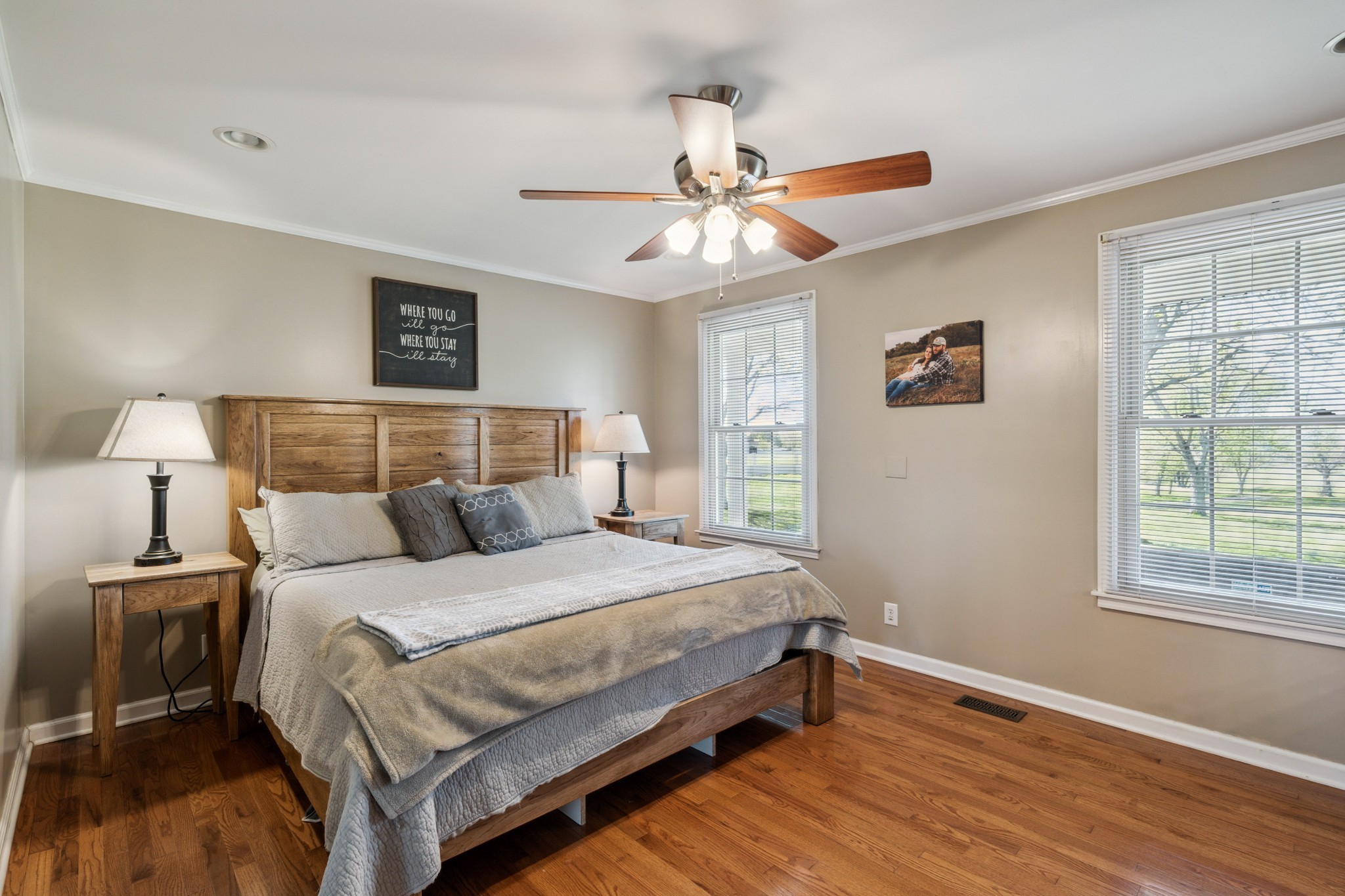 4520 Mt Sharon Road Greenbrier, TN 37073 - Photo 16 of 42 a bedroom with a bed and wooden floor