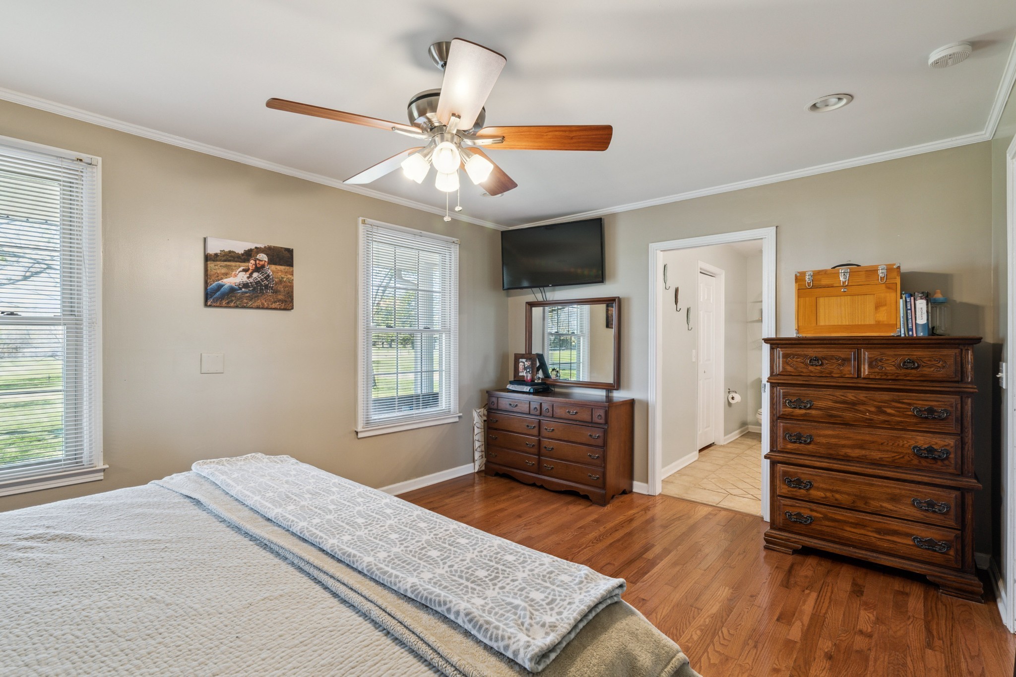4520 Mt Sharon Road Greenbrier, TN 37073 - Photo 17 of 42 a bedroom with a bed and wooden floor