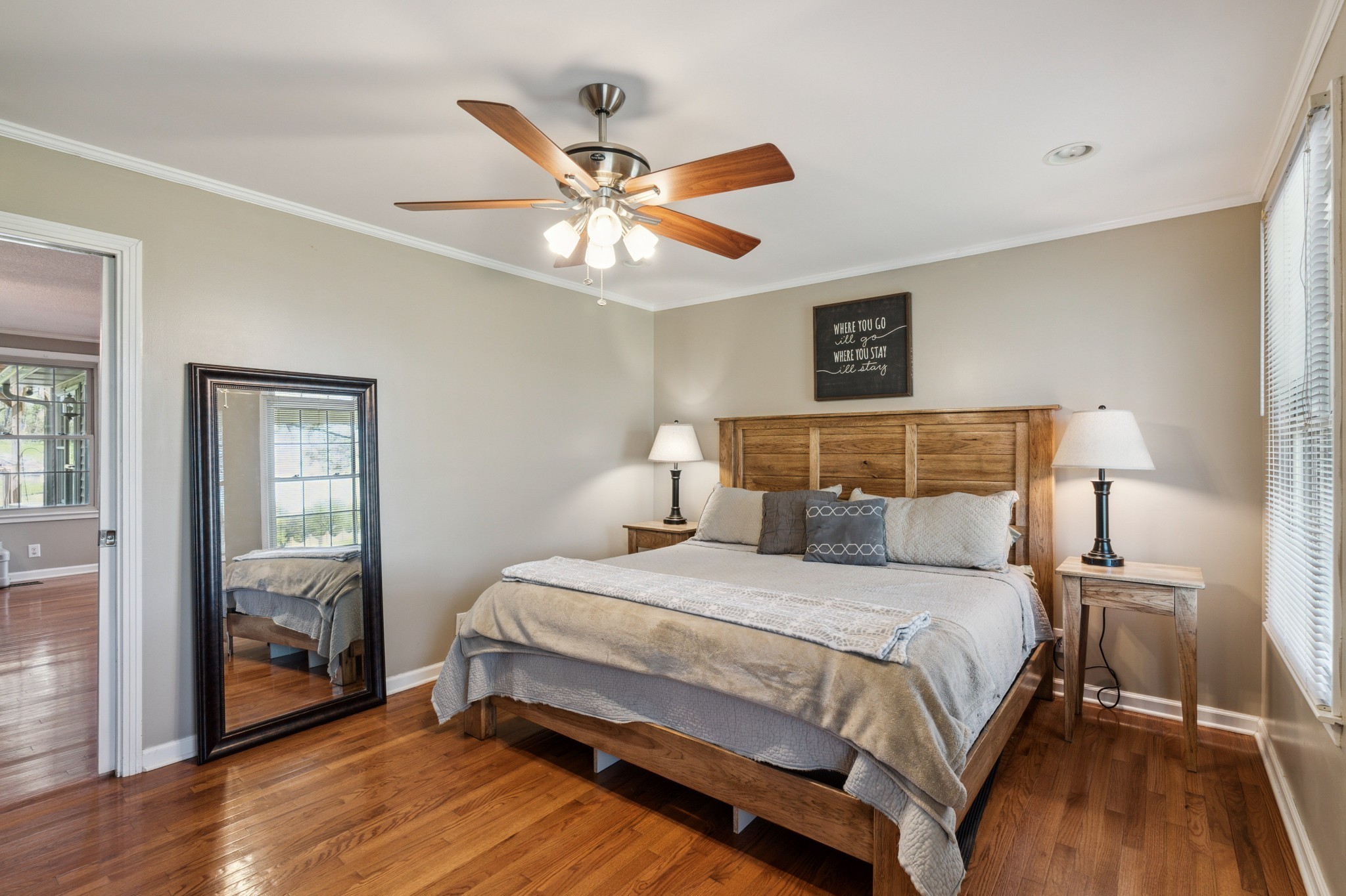 4520 Mt Sharon Road Greenbrier, TN 37073 - Photo 18 of 42 a bedroom with a bed and wooden floor