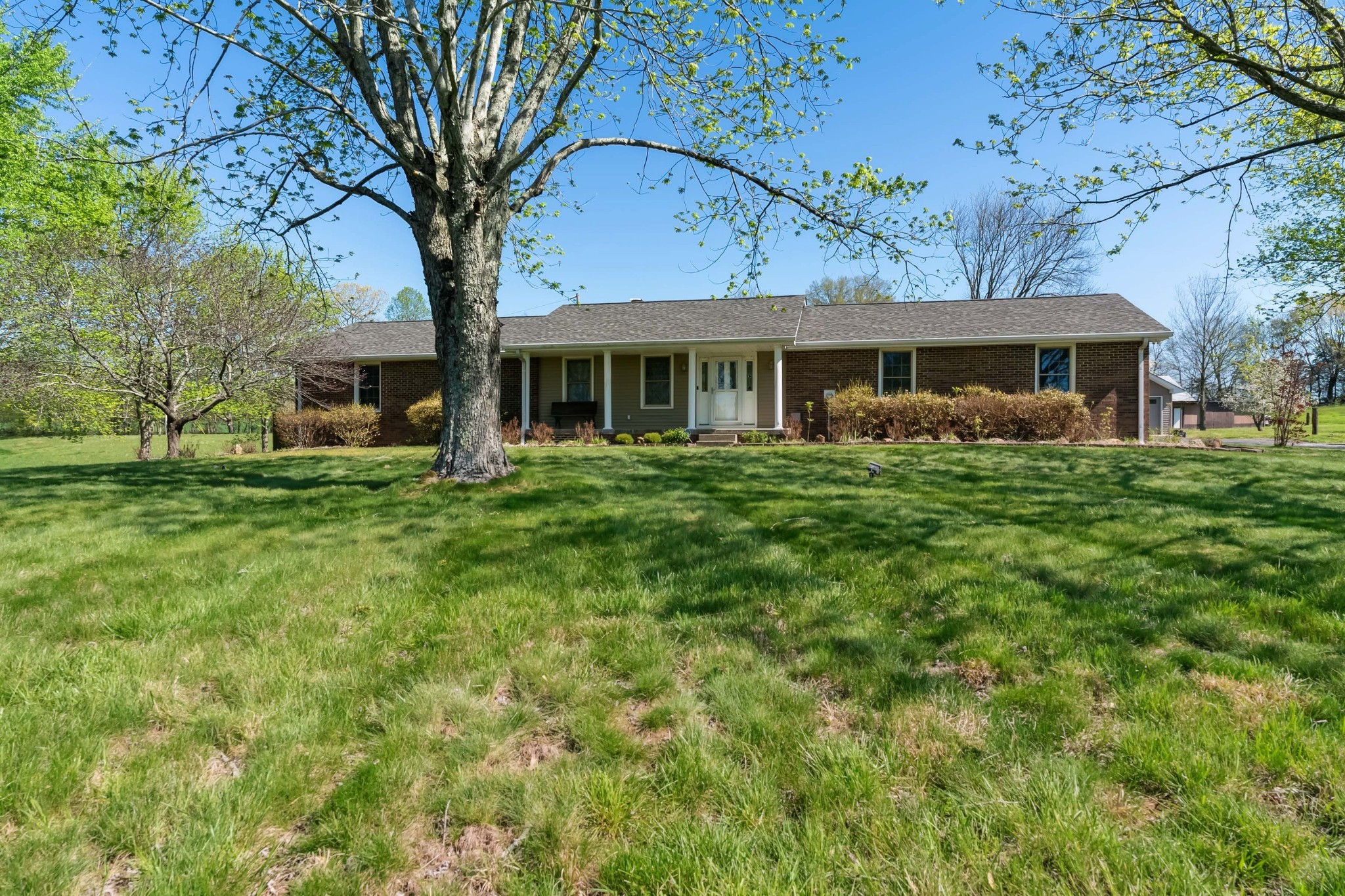 4520 Mt Sharon Road Greenbrier, TN 37073 - Photo 2 of 42 a front view of a house with a garden