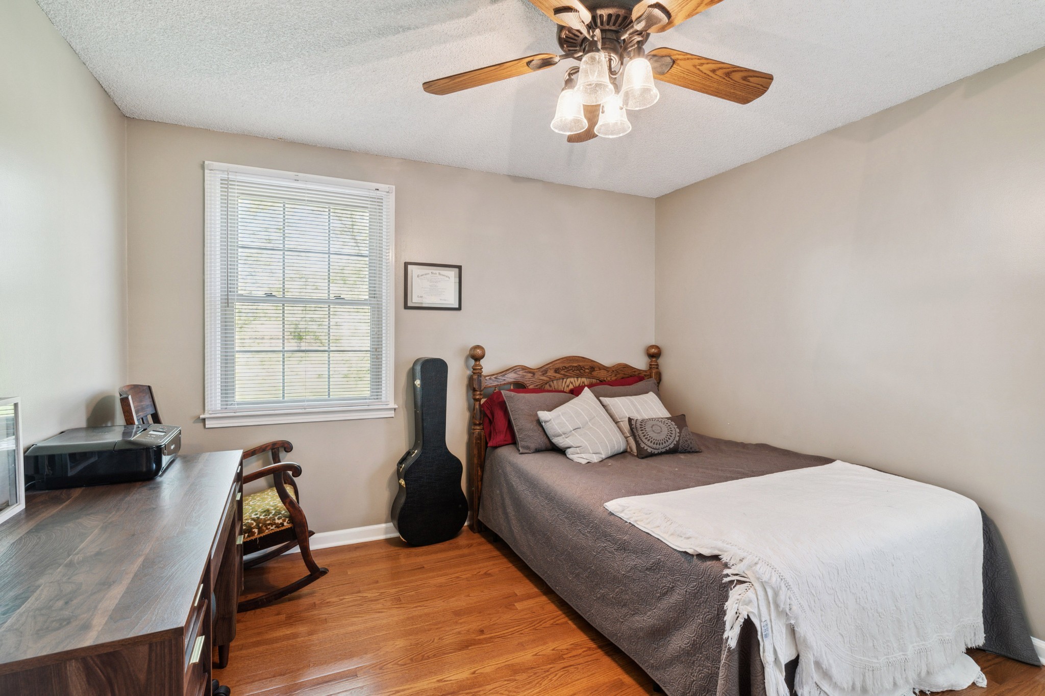 4520 Mt Sharon Road Greenbrier, TN 37073 - Photo 23 of 42 a bed room with a bed and a chair
