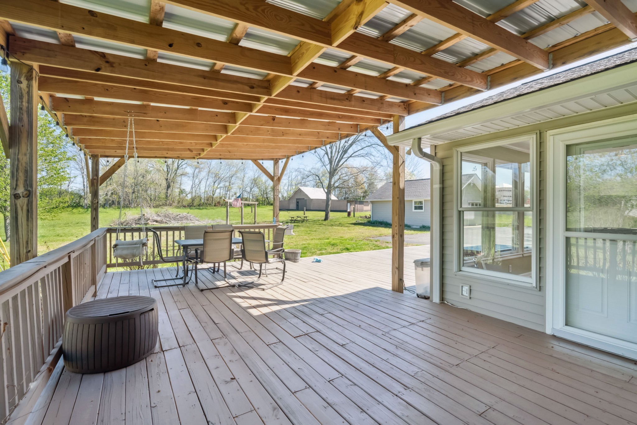 4520 Mt Sharon Road Greenbrier, TN 37073 - Photo 26 of 42 a view of a deck yard and patio with wooden floor