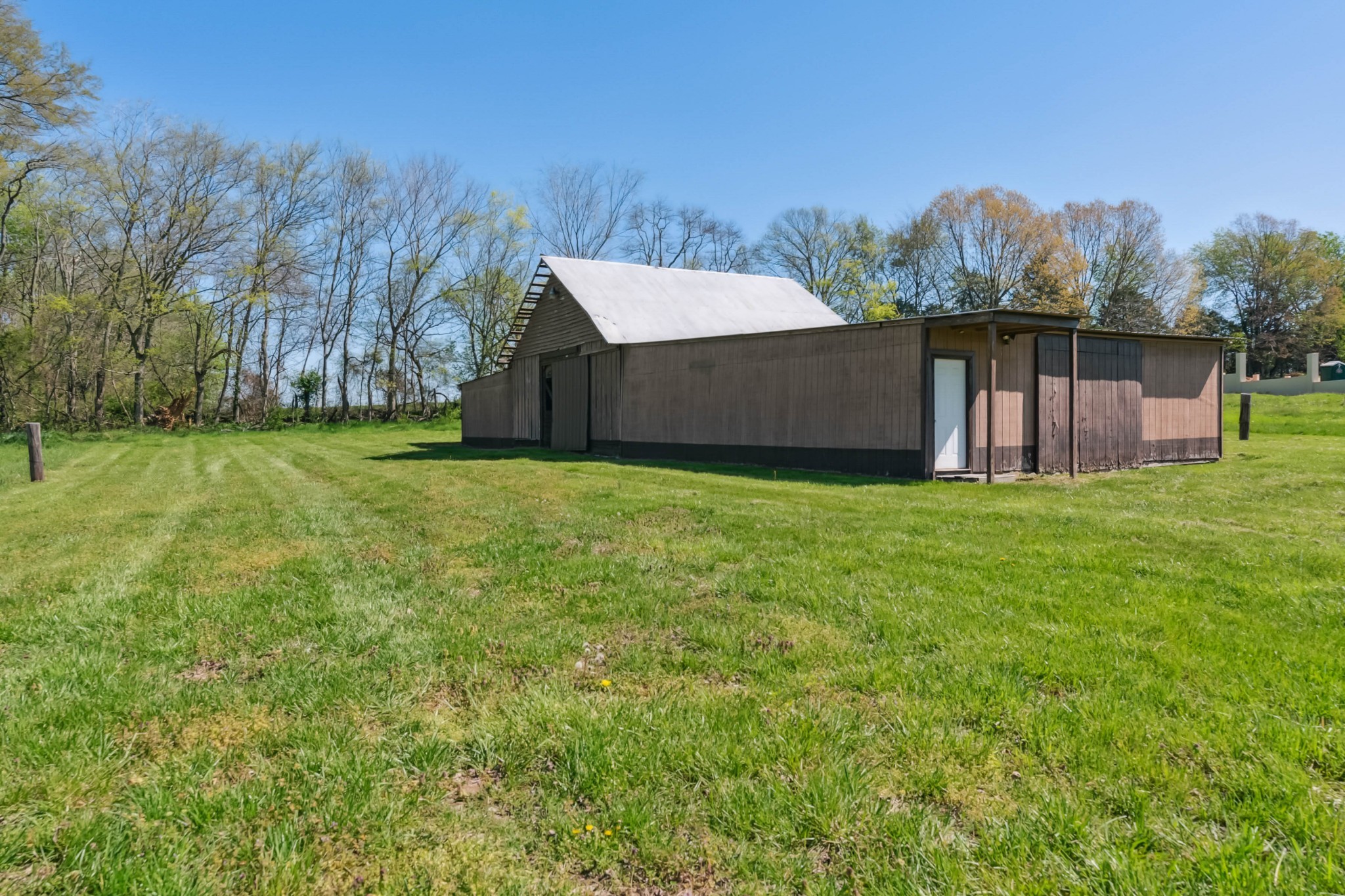 4520 Mt Sharon Road Greenbrier, TN 37073 - Photo 29 of 42 a view of a backyard with large trees
