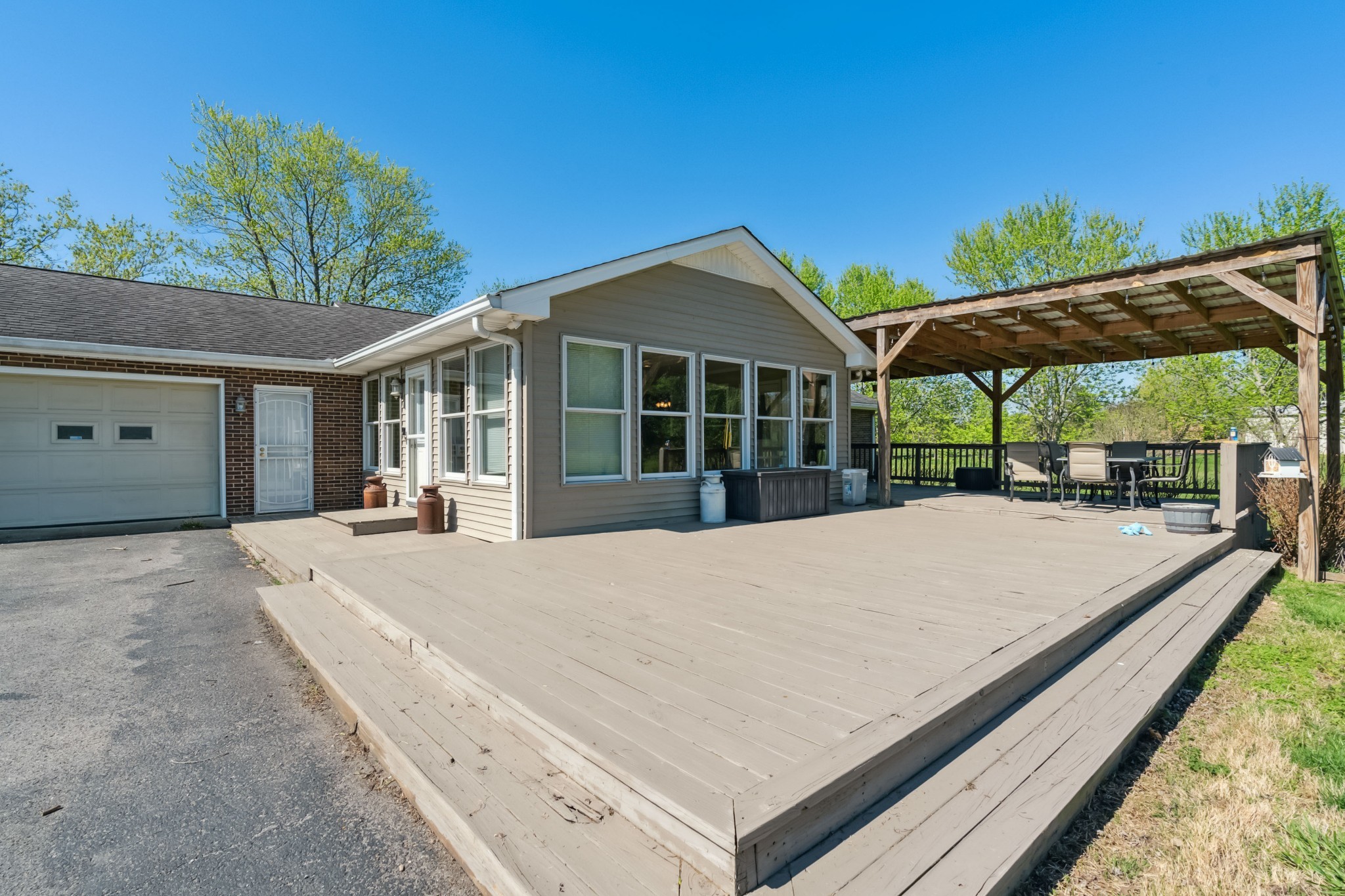 4520 Mt Sharon Road Greenbrier, TN 37073 - Photo 33 of 42 a view of a house with backyard and porch