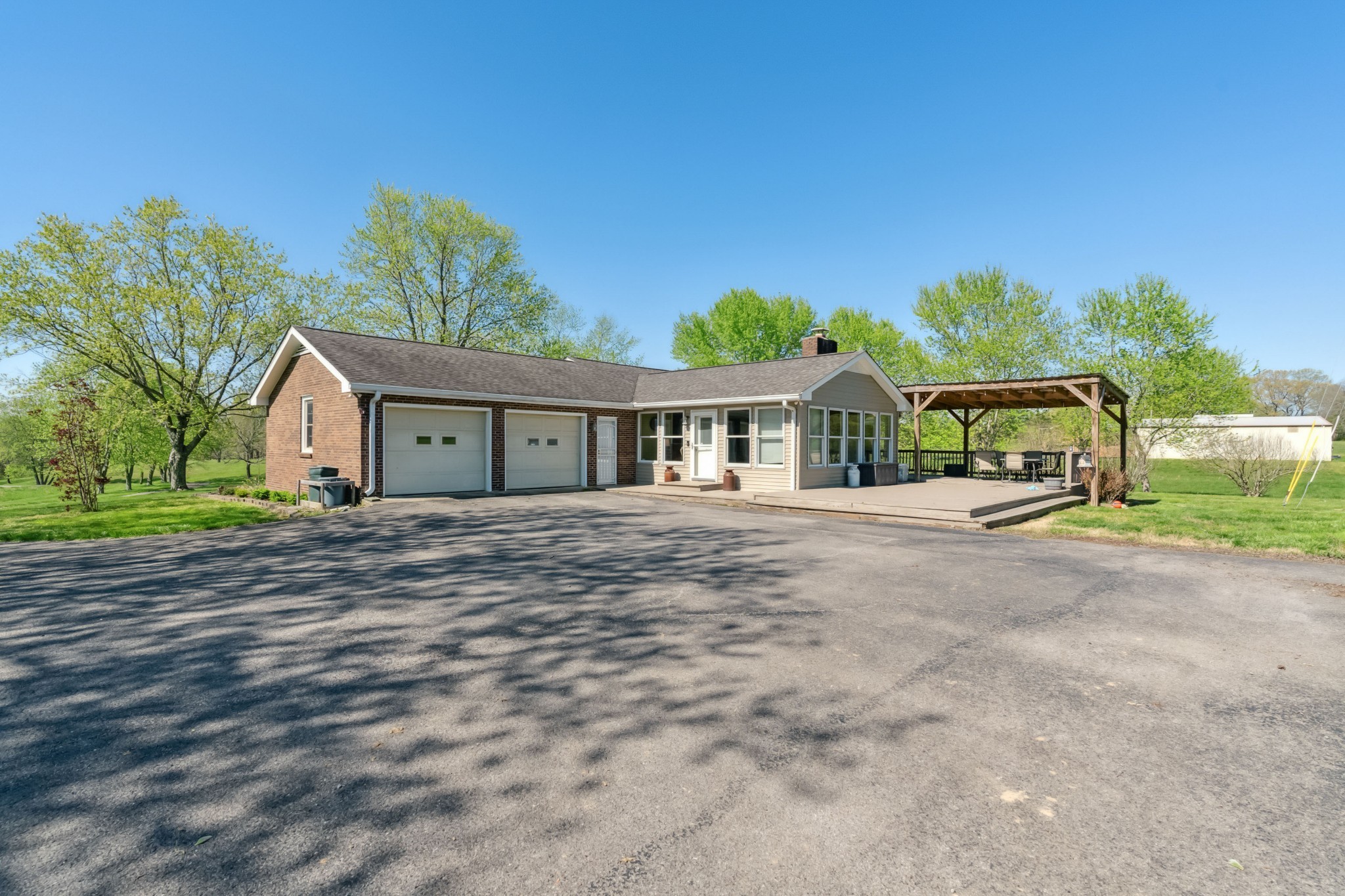 4520 Mt Sharon Road Greenbrier, TN 37073 - Photo 34 of 42 a front view of house with a garden
