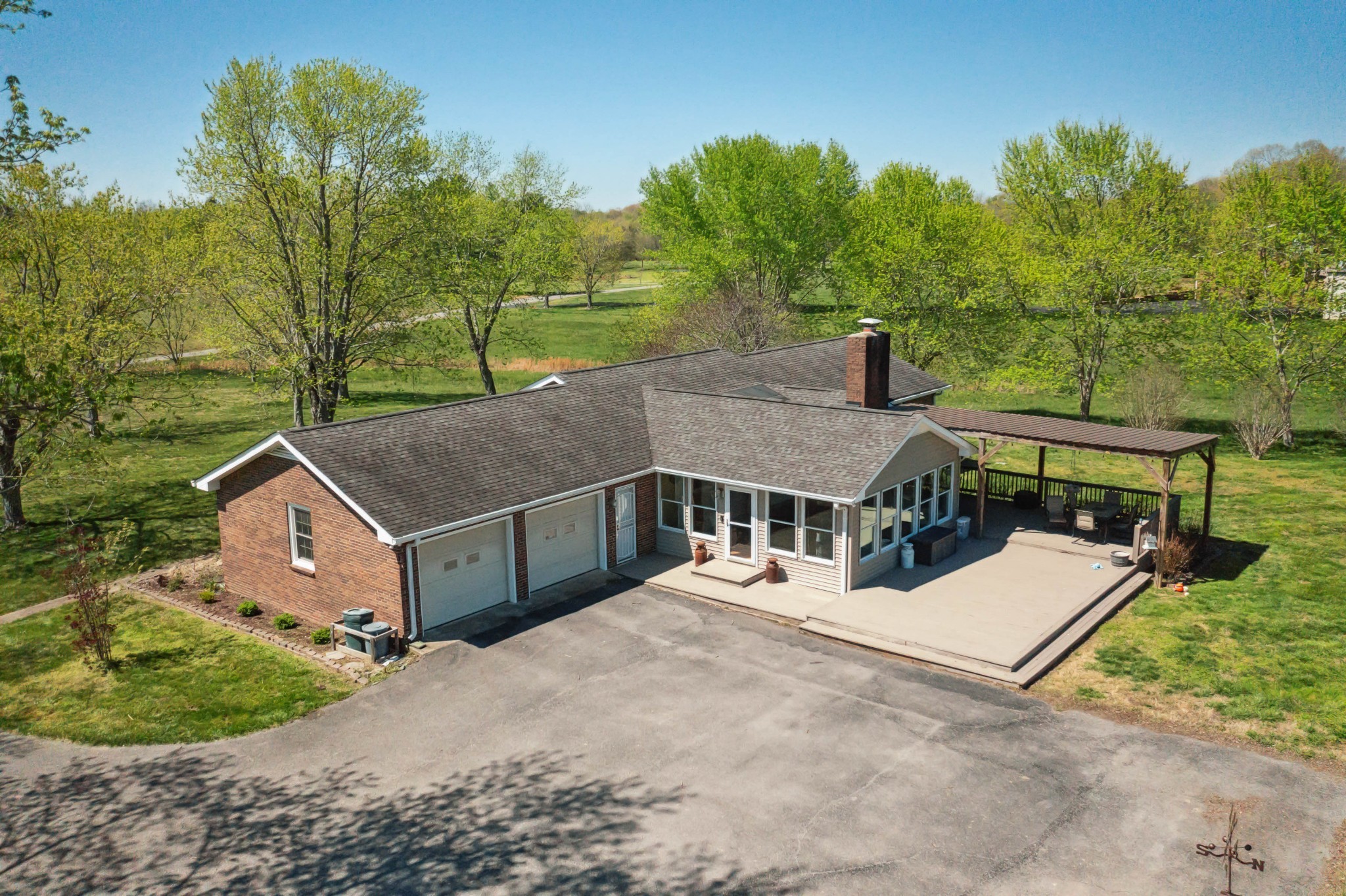 4520 Mt Sharon Road Greenbrier, TN 37073 - Photo 38 of 42 a view of a house with a yard and sitting area