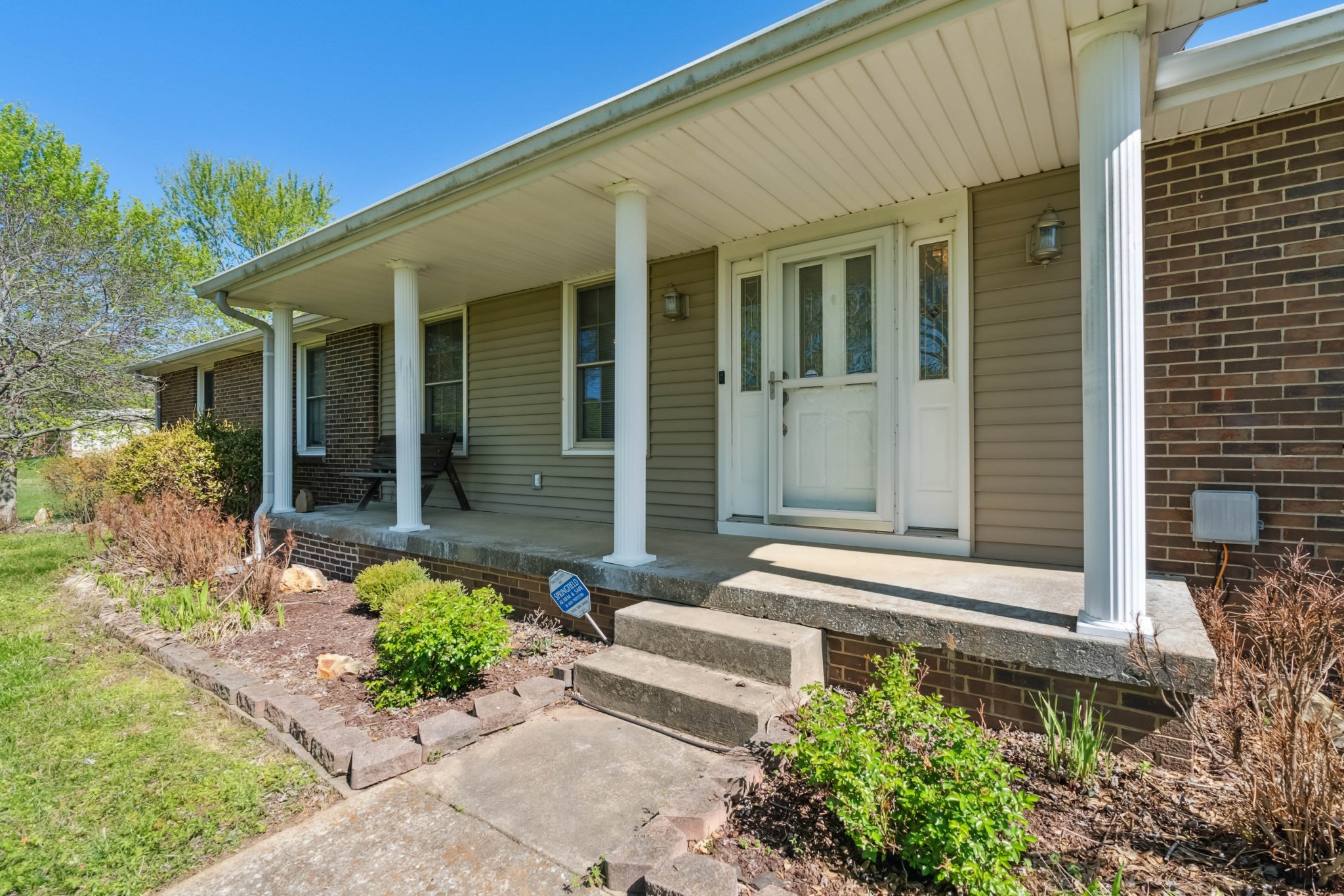 4520 Mt Sharon Road Greenbrier, TN 37073 - Photo 4 of 42 front view of a house with potted plants