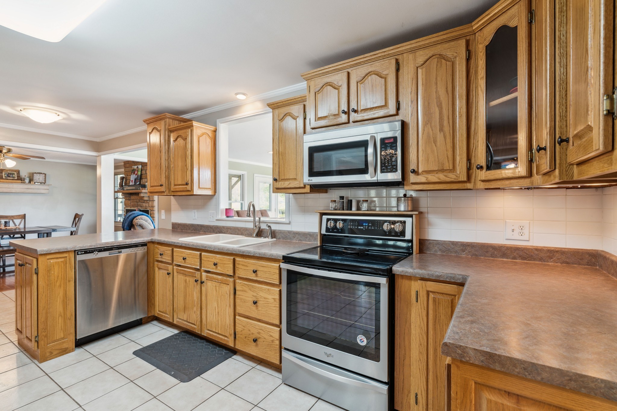 4520 Mt Sharon Road Greenbrier, TN 37073 - Photo 6 of 42 a kitchen with cabinets stainless steel appliances and a sink