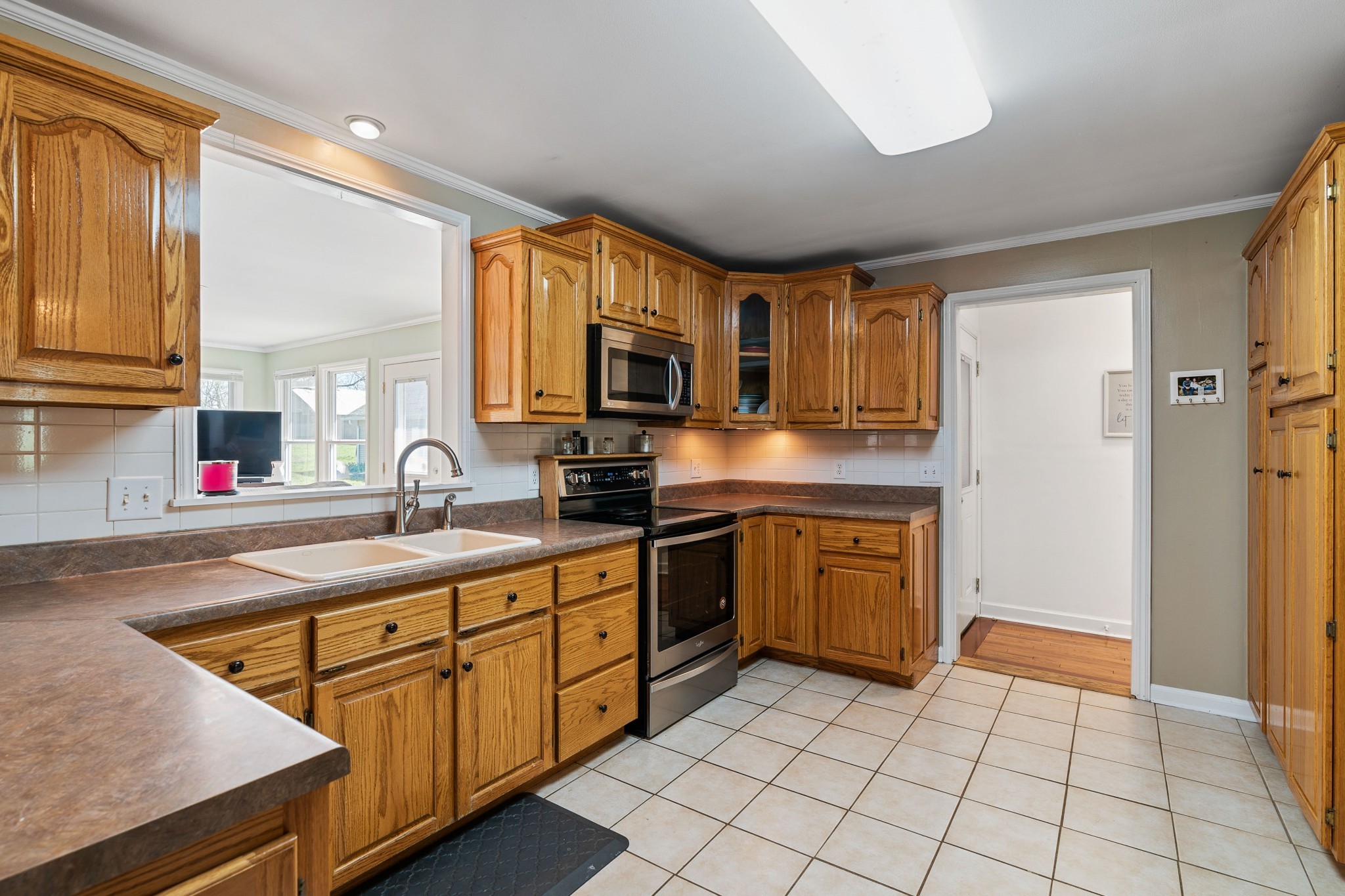 4520 Mt Sharon Road Greenbrier, TN 37073 - Photo 7 of 42 a kitchen with stainless steel appliances granite countertop a sink and cabinets