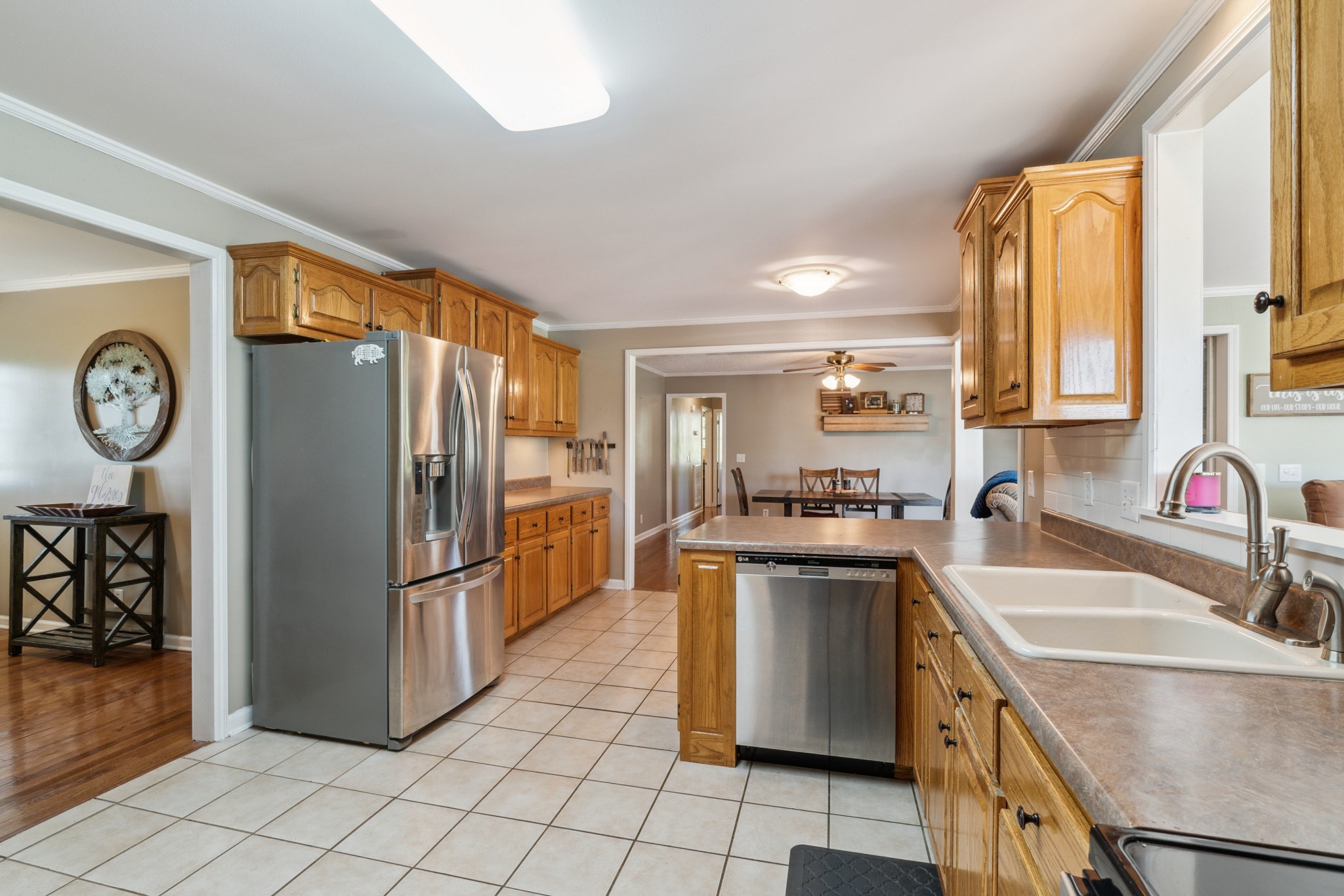 4520 Mt Sharon Road Greenbrier, TN 37073 - Photo 8 of 42 a kitchen with stainless steel appliances granite countertop a refrigerator a stove and a sink