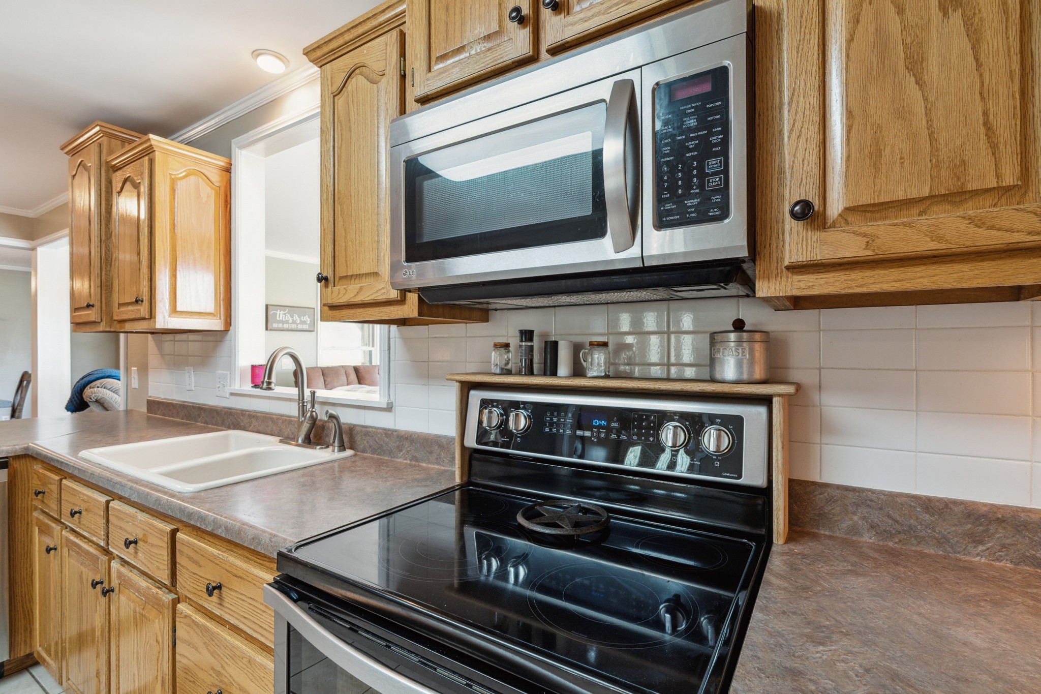 4520 Mt Sharon Road Greenbrier, TN 37073 - Photo 9 of 42 a kitchen with a stove and a microwave