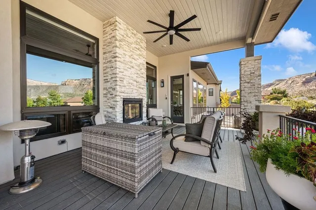 a view of a livingroom with furniture and a fireplace
