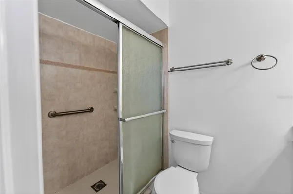 a utility room with sink dryer and washer