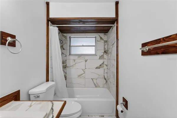 a view of swimming pool with a yard