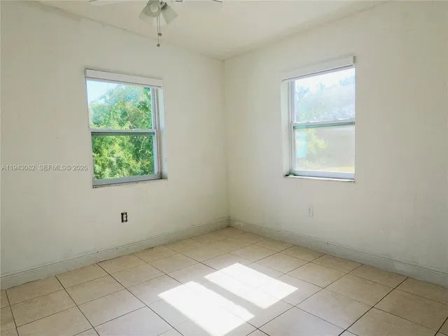 an empty room with windows